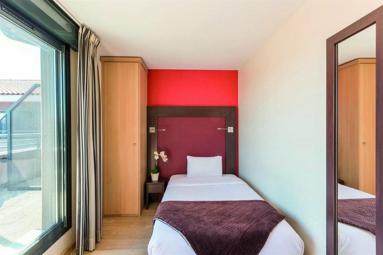 Clarion Aparthotel Toulouse Blagnac Airport Bagian luar foto